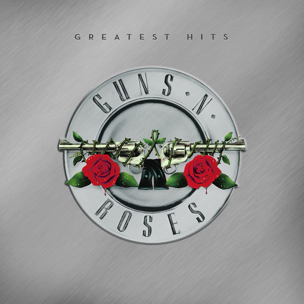 An image of the Guns n roses greatest hits album artwork with dual revolvers wrapped in roses against a grey metallic background
